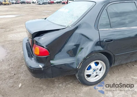 1999 Toyota Corolla Ce z USA, uszkodzony, nr VIN 1NXBR12EXXZ275998